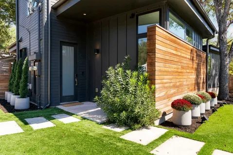 a backyard of a house with lots of green space