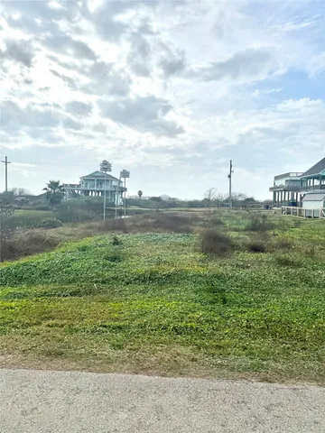 a view of a lake with a big yard