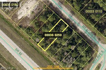 548 Meadow Road Lehigh Acres, FL 33973 - Photo 1 of 1 a close up of a street sign