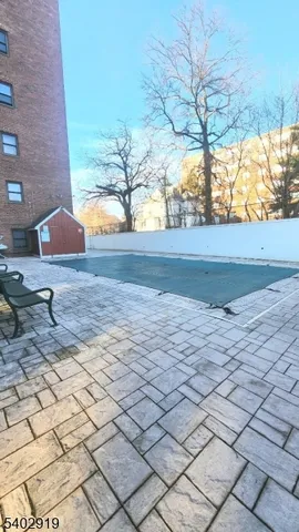 a view of backyard of a house