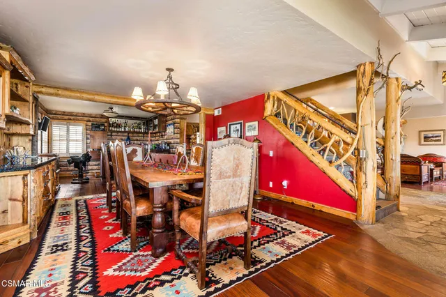 a view of a bathroom with a sink a mirror and a shower