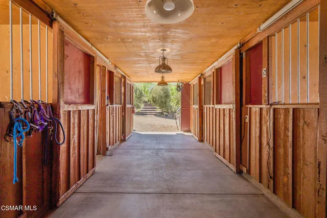 a view of a backyard with table and chairs