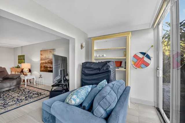 a living room with furniture and a couch