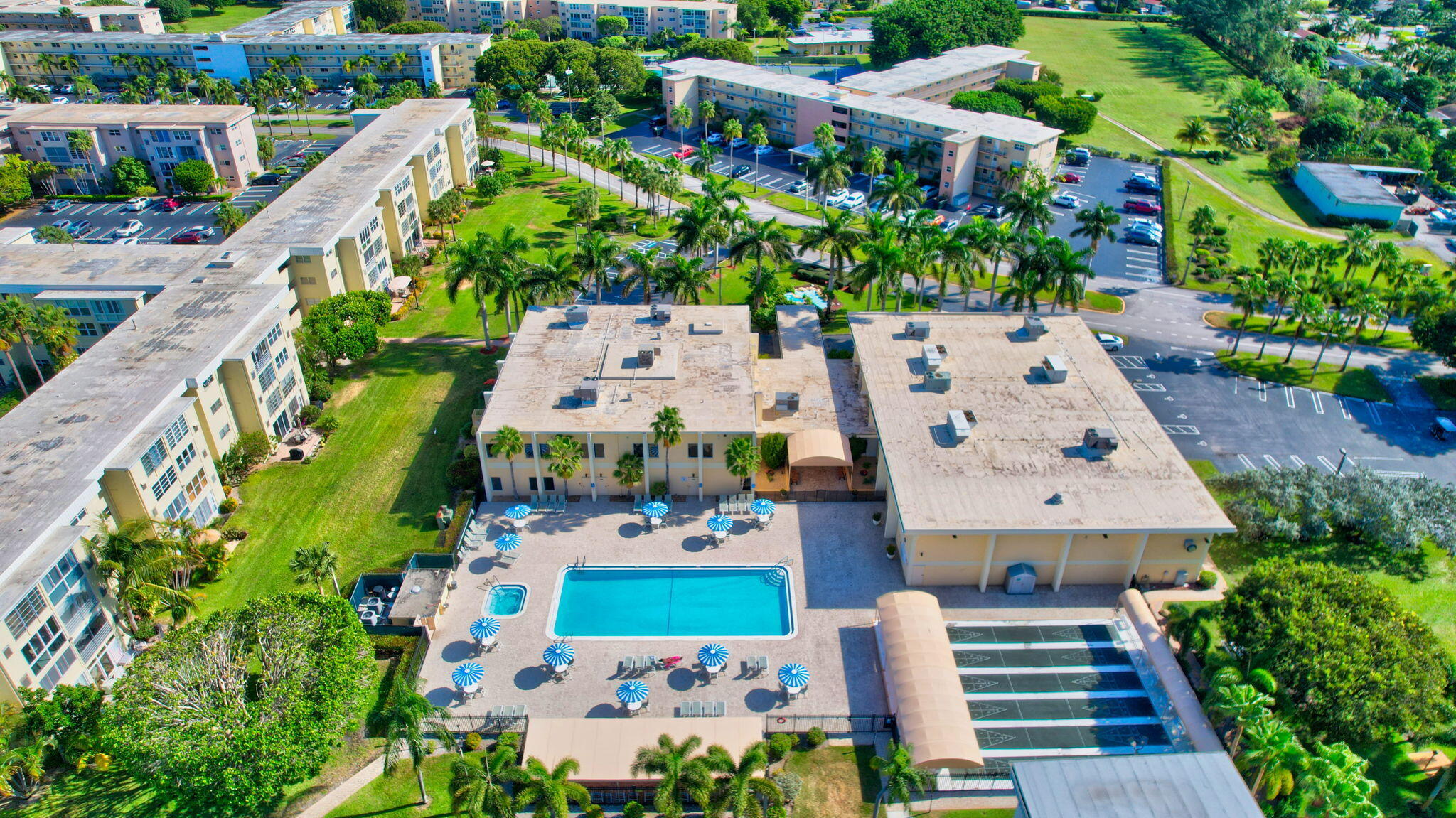 2400 Northeast 1st Lane, Unit 102 Boynton Beach, FL 33435 - Photo 32 of 44 an aerial view of a house with a garden