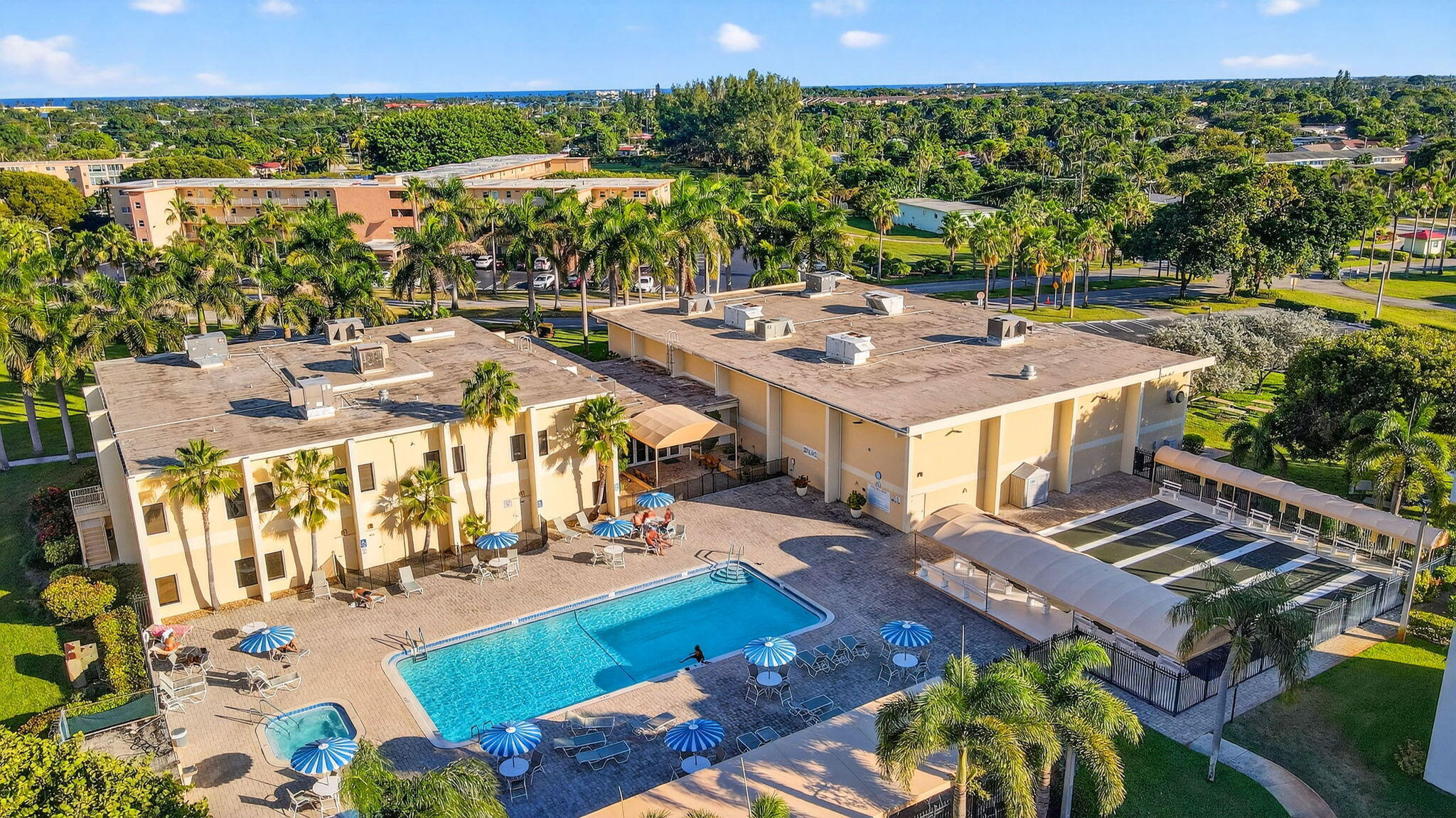 2400 Northeast 1st Lane, Unit 102 Boynton Beach, FL 33435 - Photo 36 of 44 a view of a city with lawn chairs