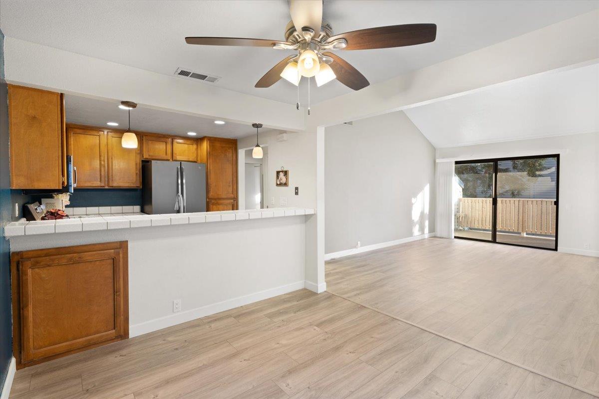 2280 Hurley Way, Unit 32 Sacramento, CA 95825 - Photo 9 of 24 a view of a kitchen with a sink and a large window