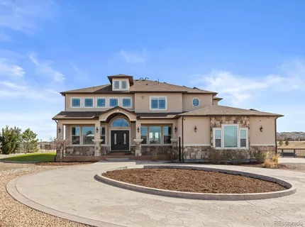 a front view of a house with entertaining space