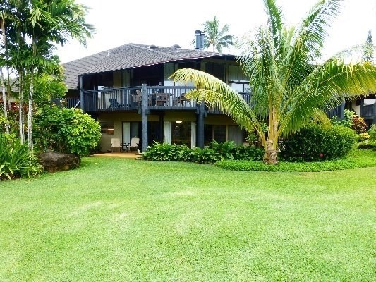 3920 Wyllie Road, Unit 6A Princeville, HI 96722 - Photo 1 of 19 a view of a house with a garden