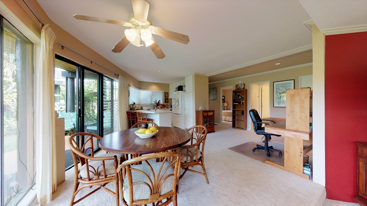 3920 Wyllie Road, Unit 6A Princeville, HI 96722 - Photo 6 of 19 a view of a dining room with furniture window and outside view