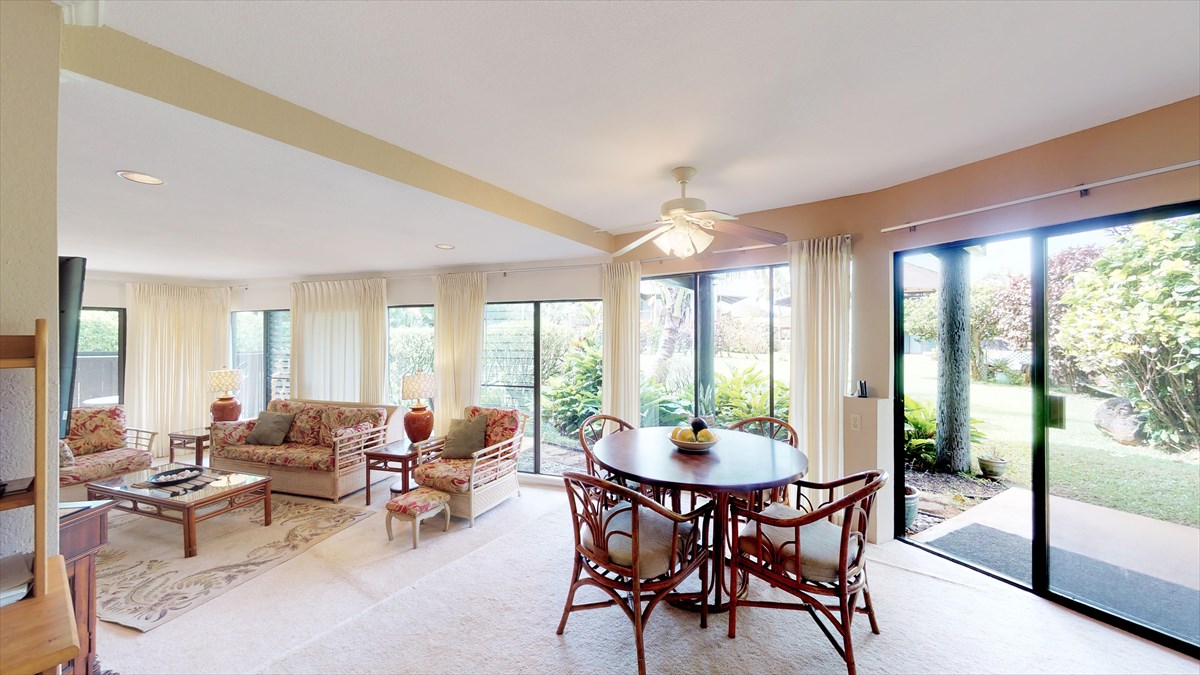 3920 Wyllie Road, Unit 6A Princeville, HI 96722 - Photo 8 of 19 a view of a dining room with furniture window and outside view