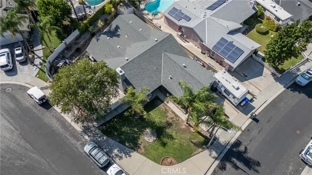 an aerial view of multiple houses with outdoor space