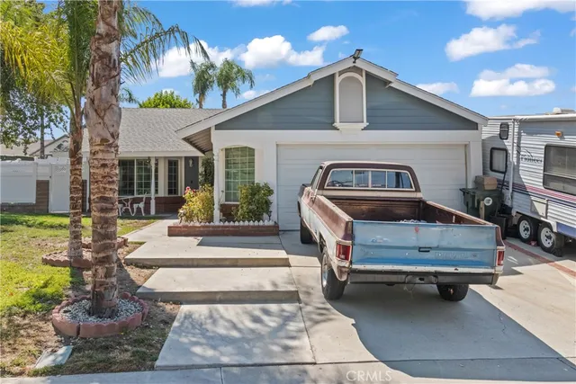 a front view of a house with swimming pool