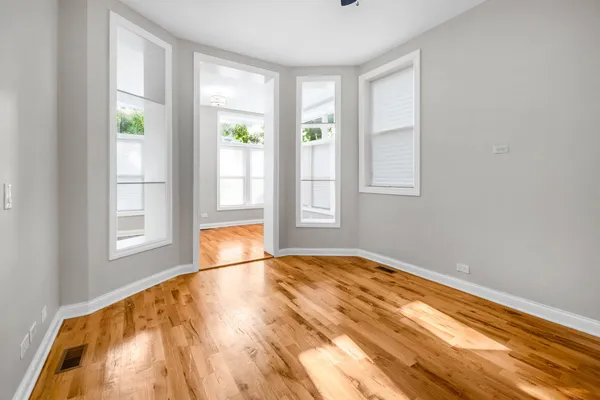 a view of an empty room and window