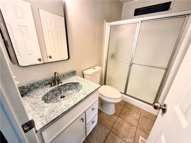 a view of a yard of a tree