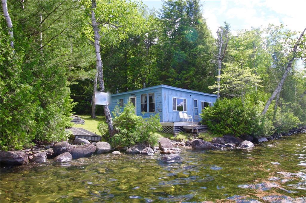 20 Berry Cove Rd Lake View Milo, ME 04463 - Photo 2 of 35 Sits right on the water's edge!
