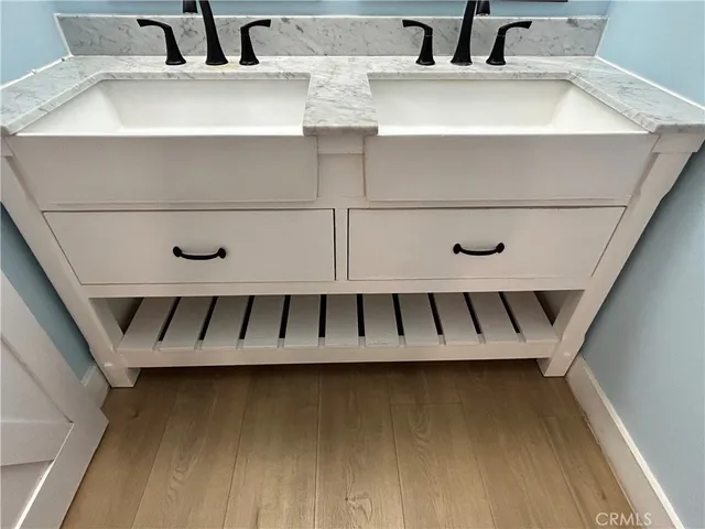 a view of staircase with wooden floor