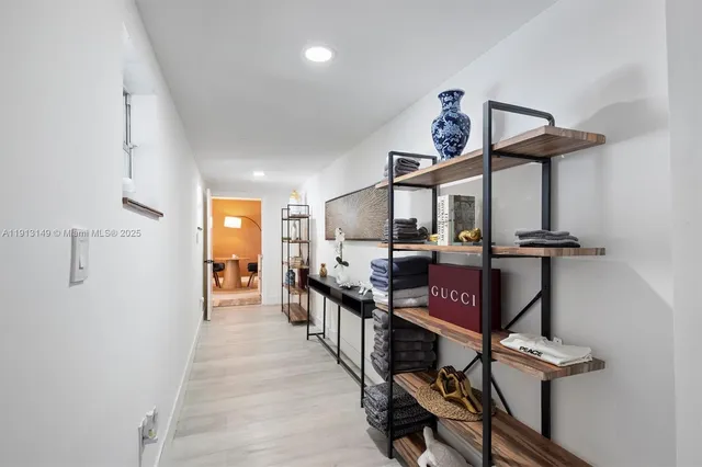 a view of a hallway with workspace