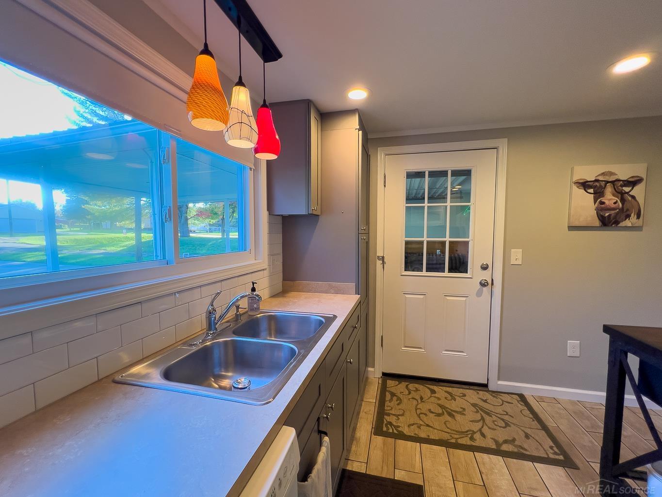1049 Radov Road Gladwin, MI 48624 - Photo 7 of 40 Kitchen sink overlooks on