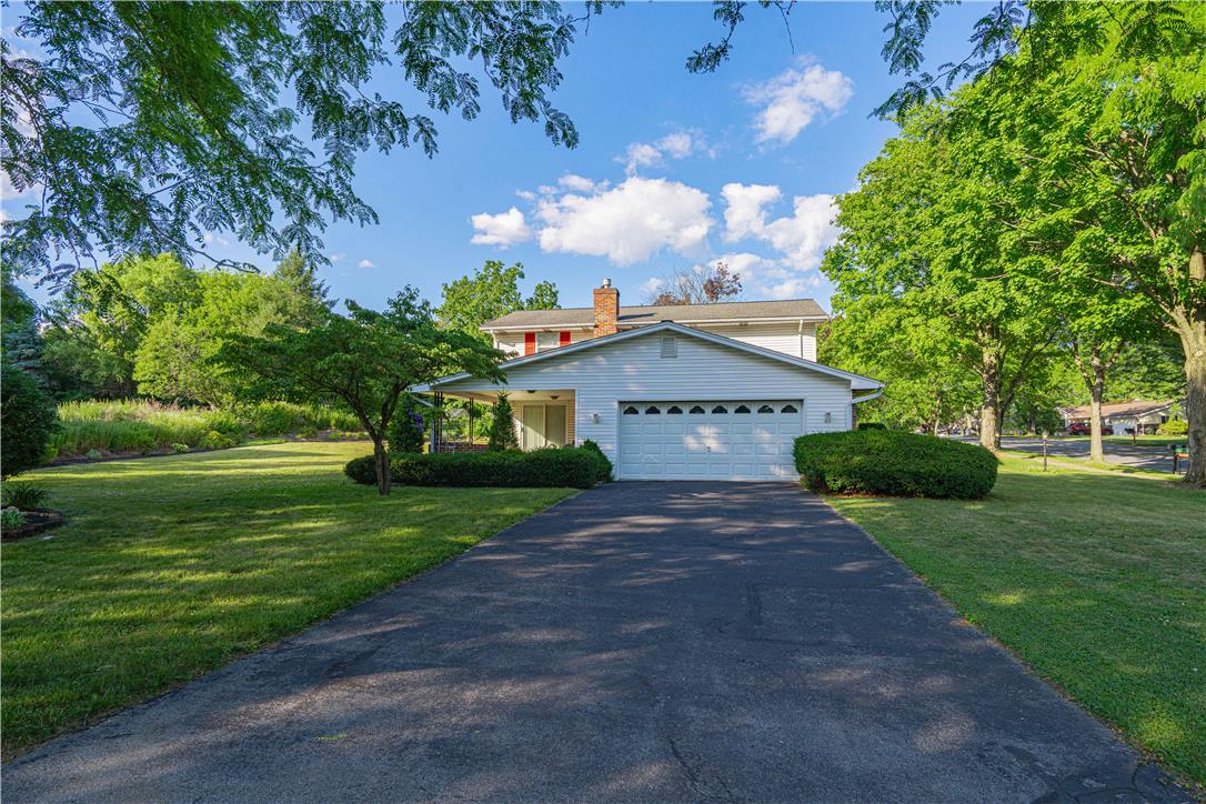 5425 Clauser Road Orefield, PA 18069 - Photo 7 of 18 A well-maintained facade with an attached garage offers inviting curb appeal.