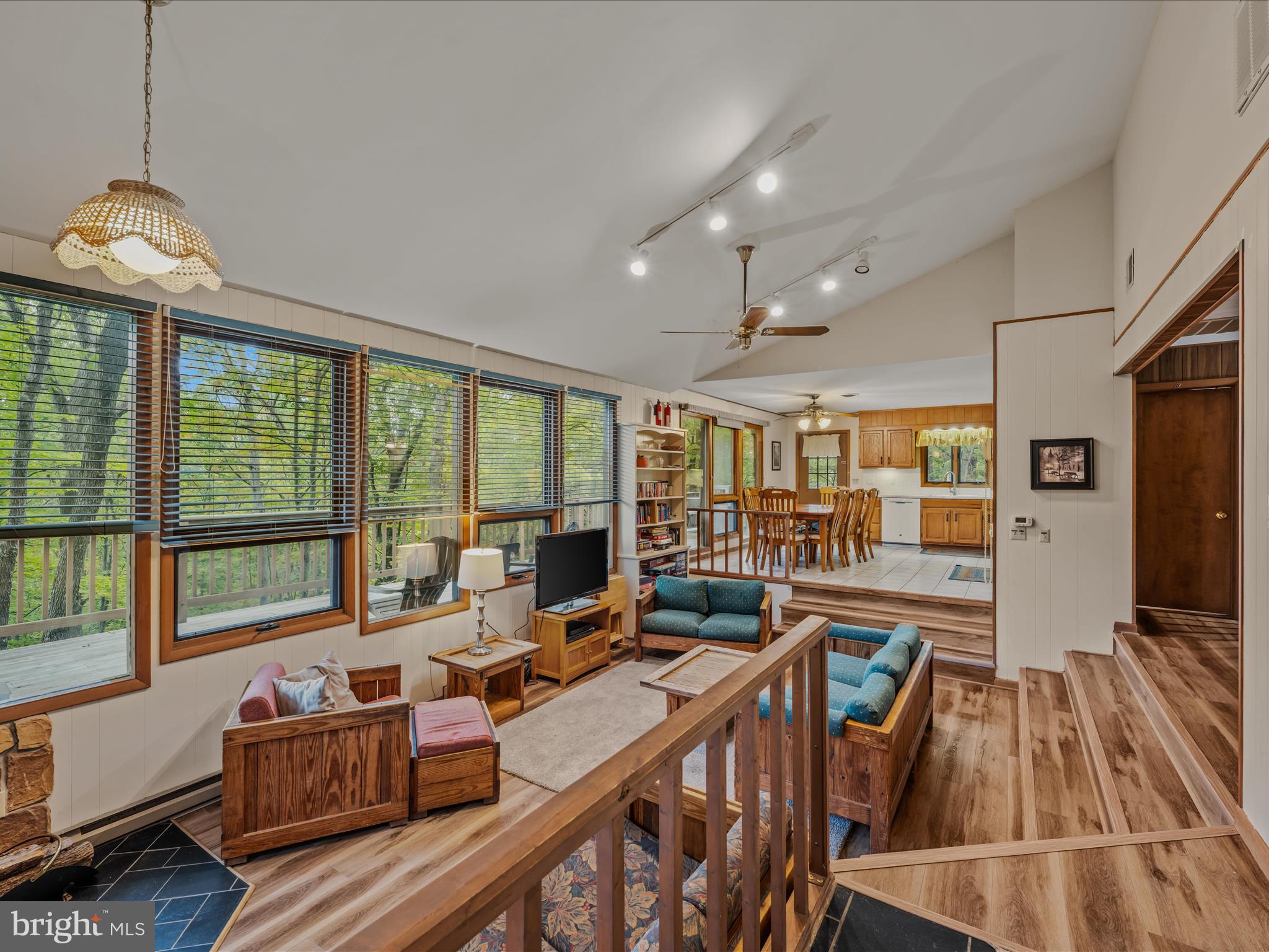35 Warbler's Way Berkeley Springs, WV 25411 - Photo 11 of 54 a living room with furniture and large windows