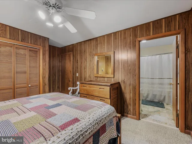 a bathroom with a shower and a bath tub