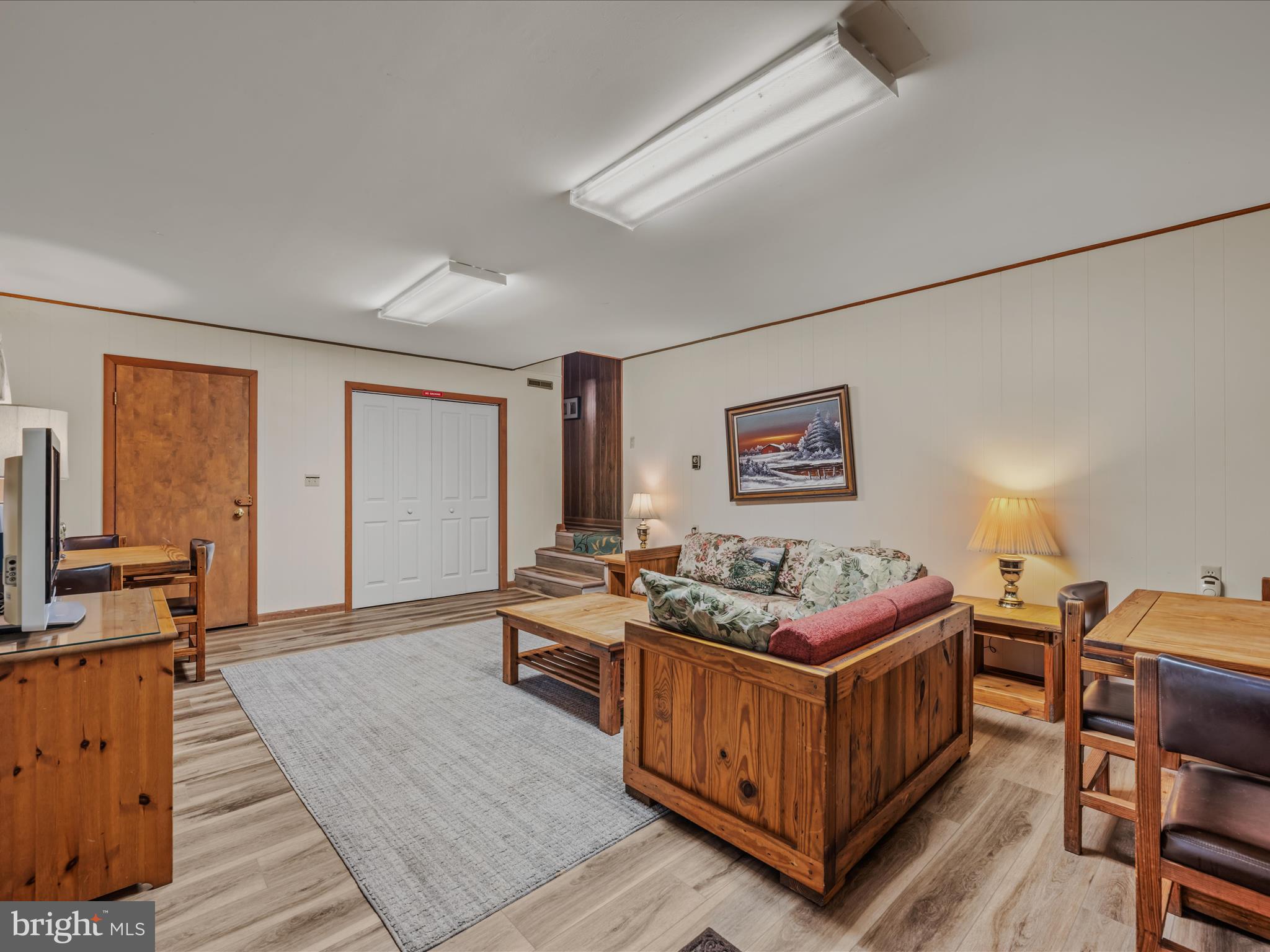 35 Warbler's Way Berkeley Springs, WV 25411 - Photo 26 of 54 a living room with furniture and a wooden floor