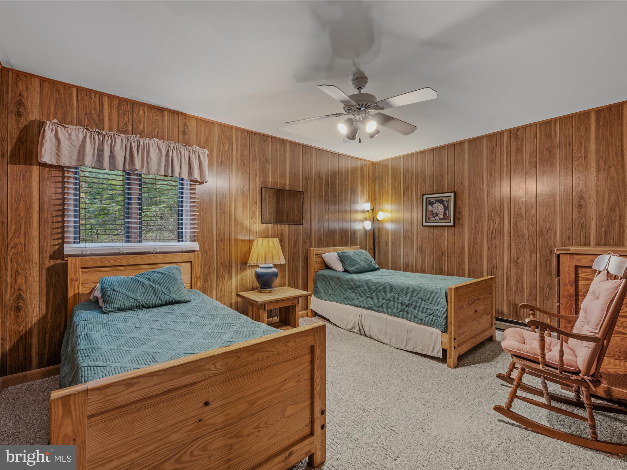 35 Warbler's Way Berkeley Springs, WV 25411 - Photo 28 of 54 a bedroom with furniture and a window