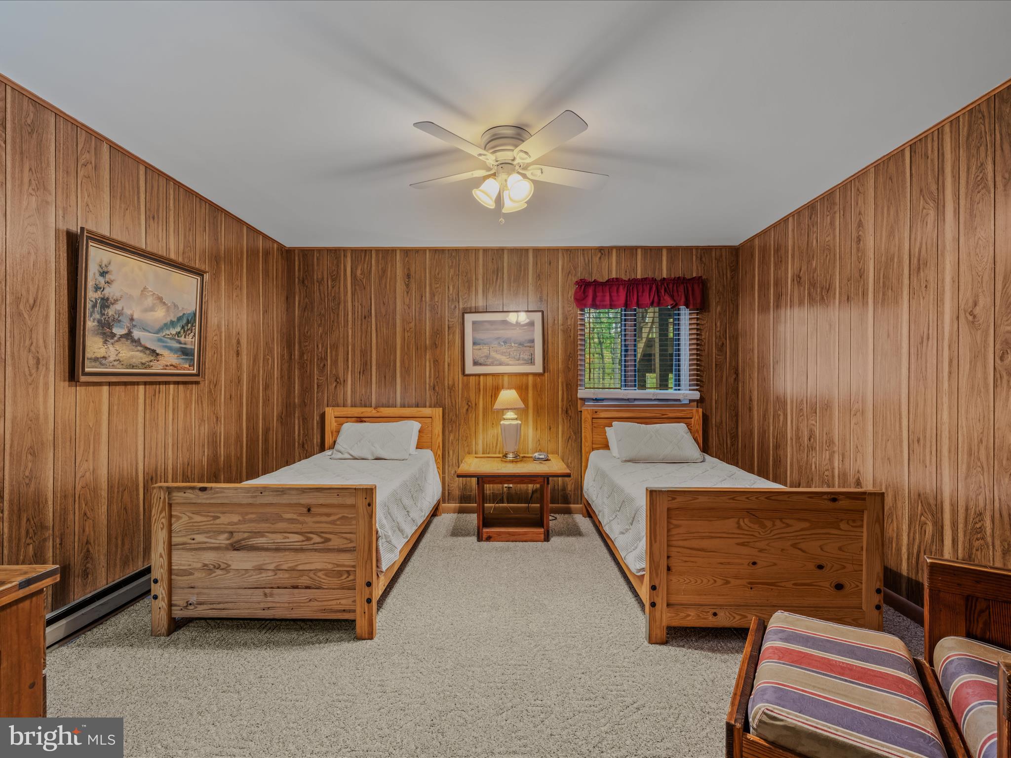 35 Warbler's Way Berkeley Springs, WV 25411 - Photo 33 of 54 a bedroom with two beds and painted walls