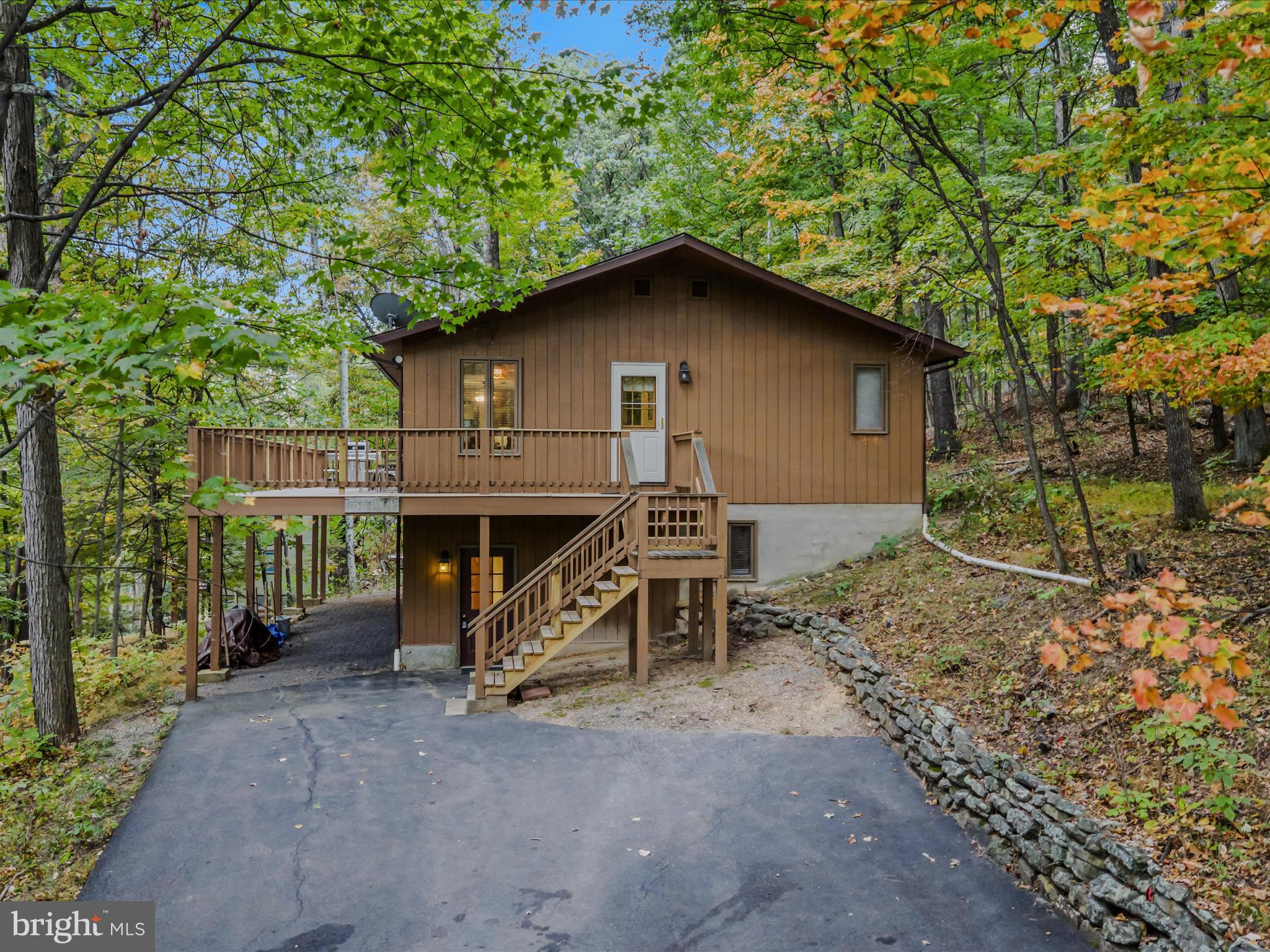 35 Warbler's Way Berkeley Springs, WV 25411 - Photo 4 of 54 a house view with a outdoor space