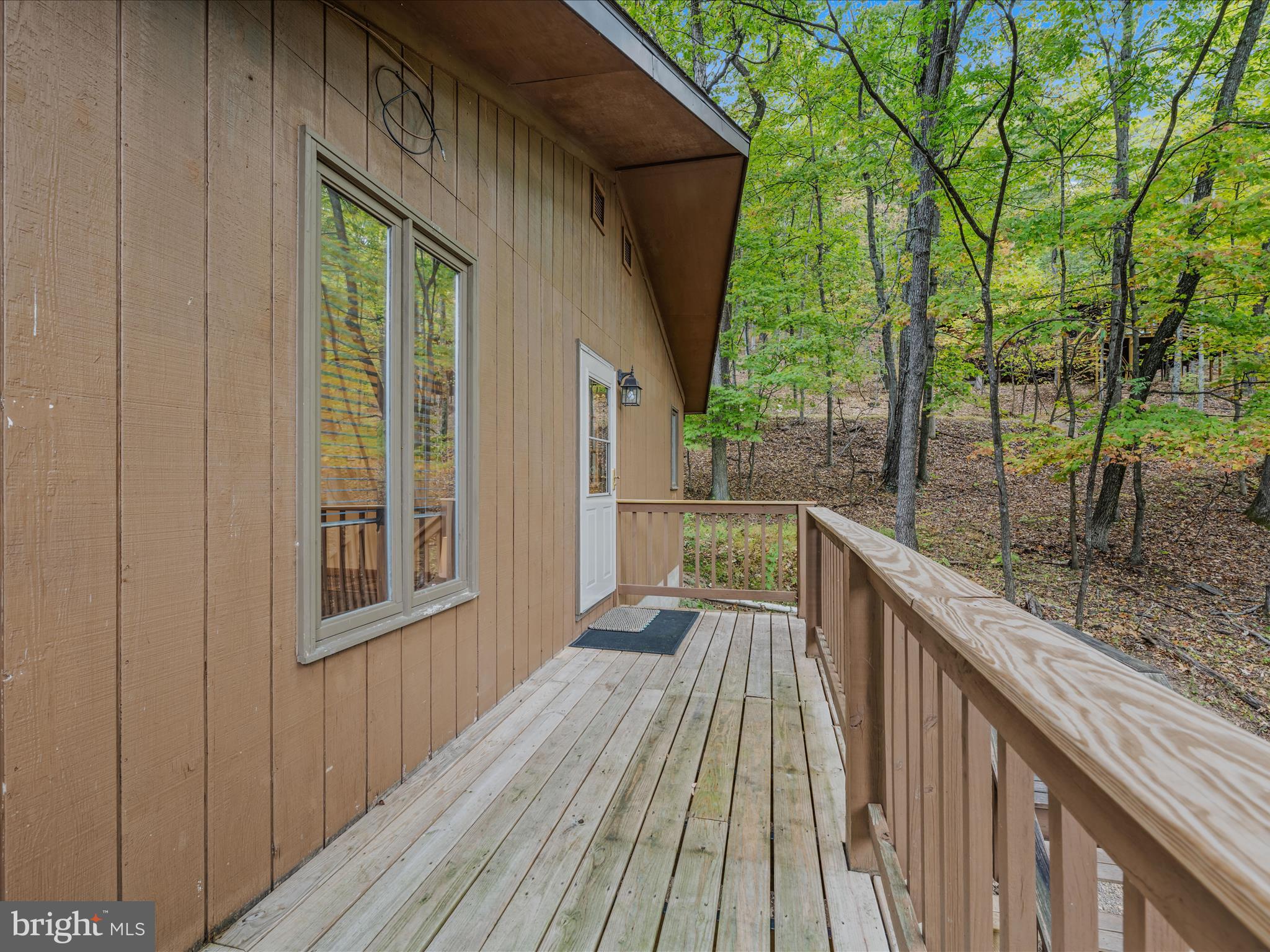 35 Warbler's Way Berkeley Springs, WV 25411 - Photo 5 of 54 a view of balcony and wooden floor