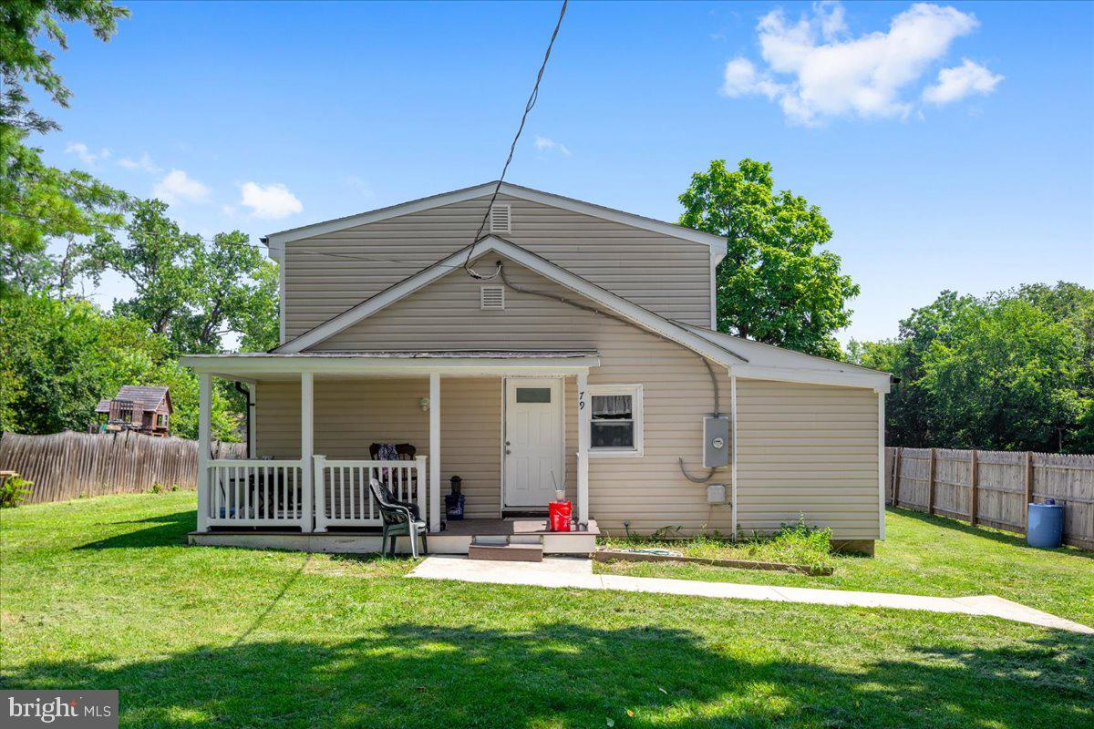 79 Bentonville Road Bentonville, VA 22610 - Photo 28 of 52 a view of a house with a yard and plants