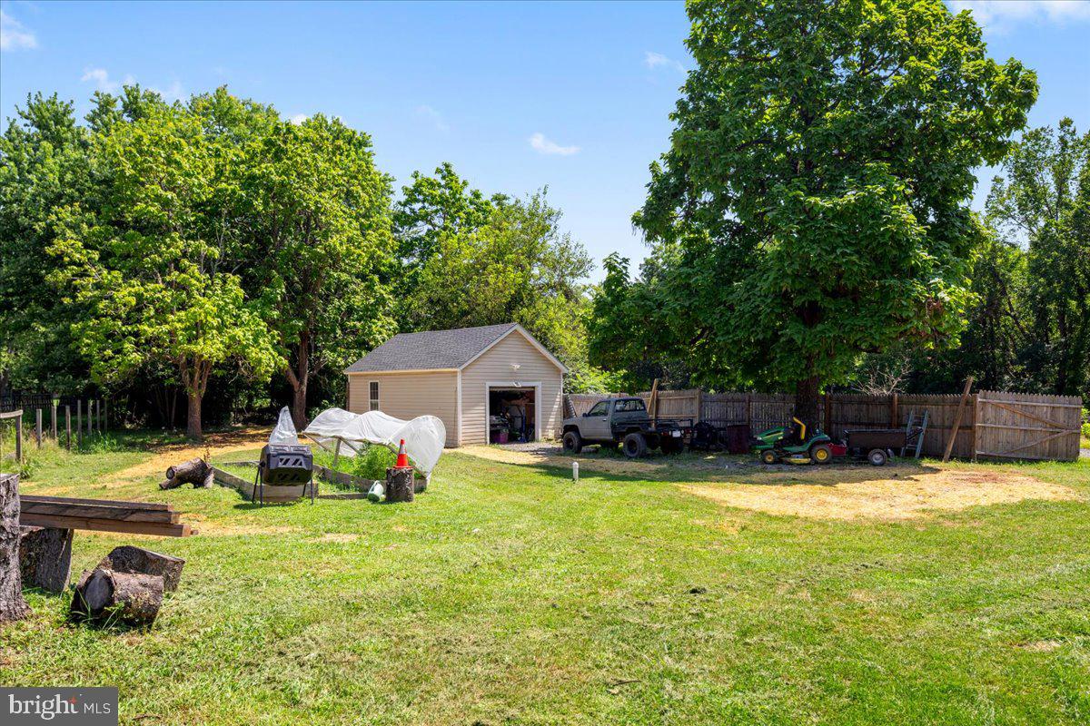 79 Bentonville Road Bentonville, VA 22610 - Photo 31 of 52 a view of a house with swimming pool and yard