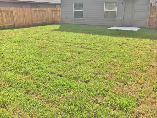 a view of a backyard with a garden