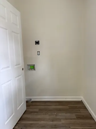 a view of small space with wooden floor