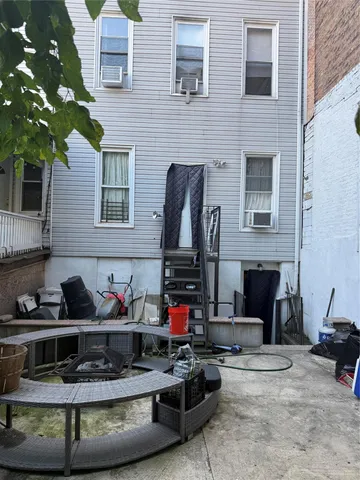 a kitchen with stainless steel appliances granite countertop a stove and cabinets