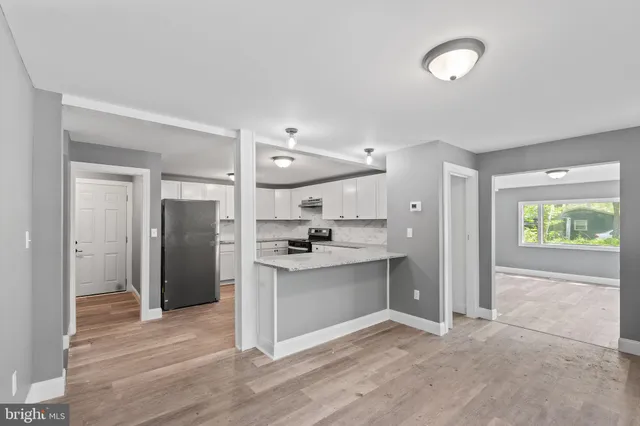 a view of a kitchen with a sink and dishwasher kitchen view