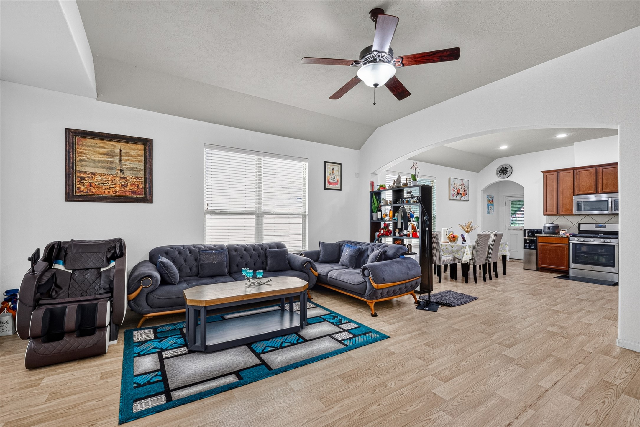 9314 Fuqua Ridge Lane Houston, TX 77075 - Photo 5 of 24 a living room with furniture and a ceiling fan