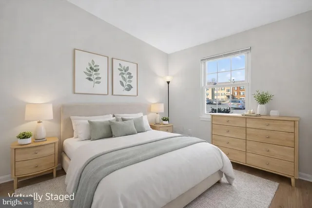 a bedroom with a bed and a closet