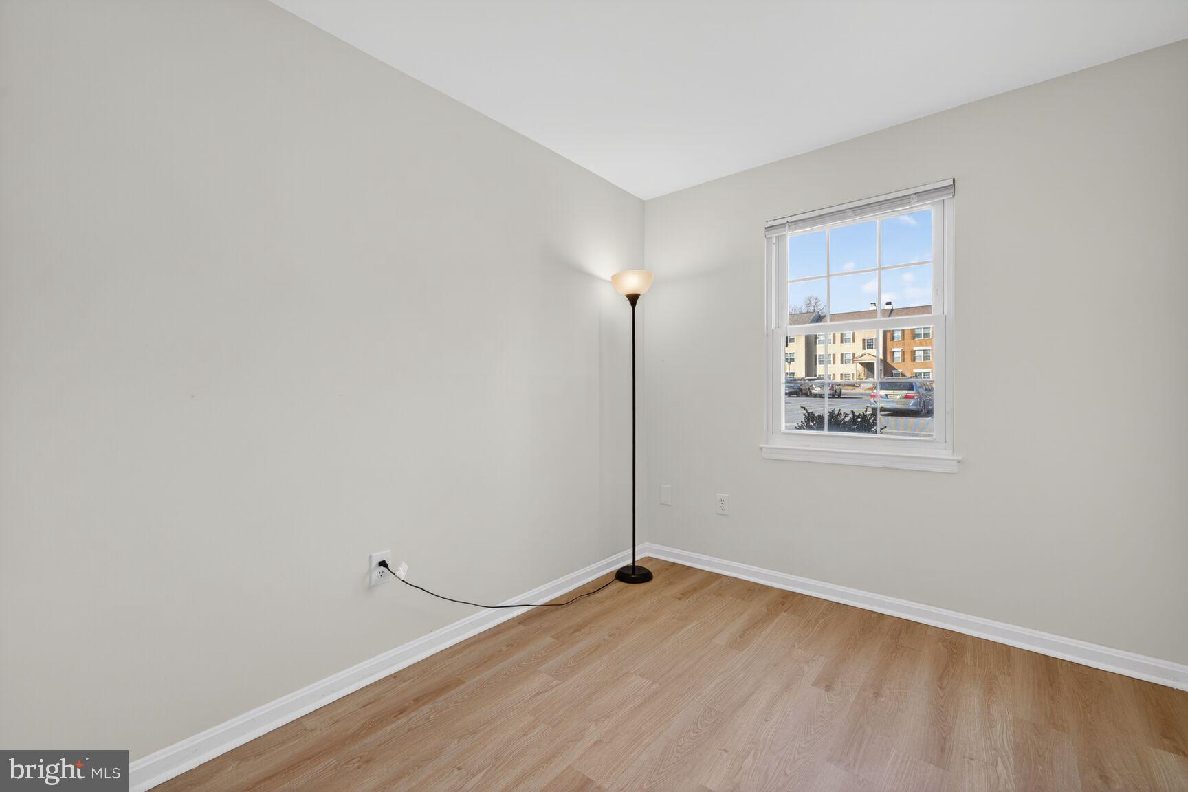 5 Normandy Square Court, Unit 1B Silver Spring, MD 20906 - Photo 12 of 29 Bedroom 2 - LVT wood flooring