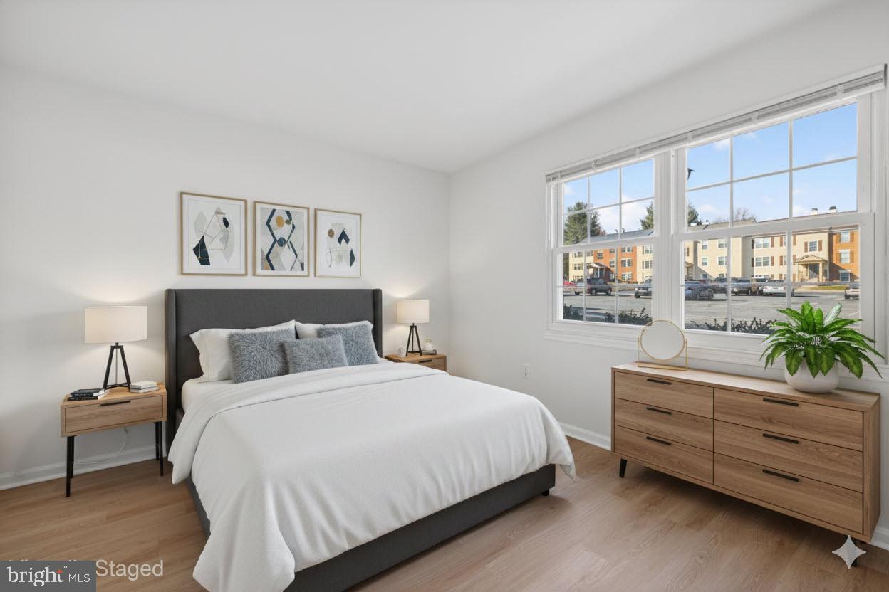 5 Normandy Square Court, Unit 1B Silver Spring, MD 20906 - Photo 7 of 29 Primary Bedroom 1 - virtually staged