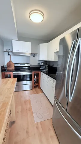 a bed room with a bed and furniture