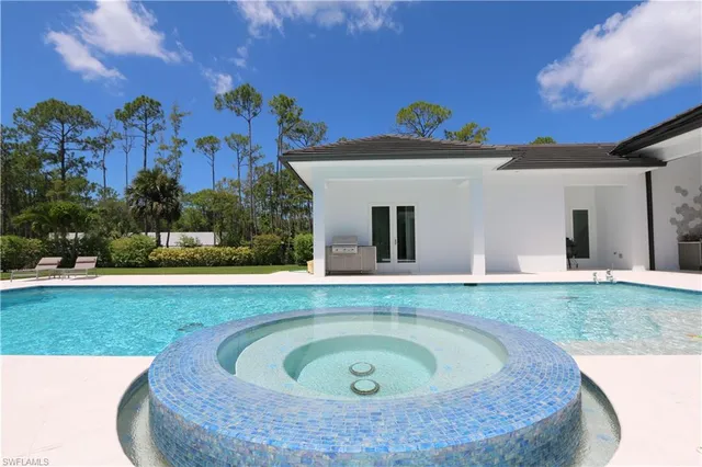 a view of outdoor space yard and swimming pool