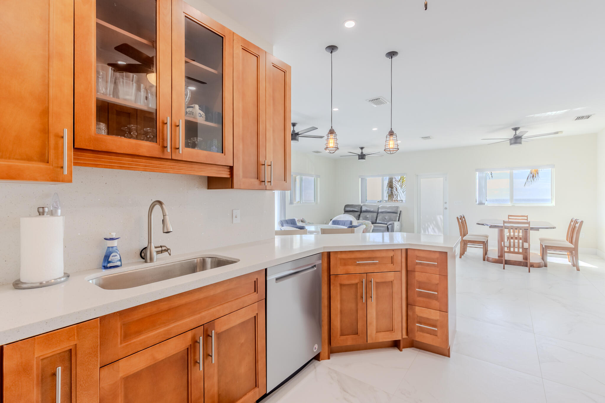 900 85th Street Marathon, FL 33050 - Photo 13 of 48 a kitchen with stainless steel appliances granite countertop a sink and cabinets