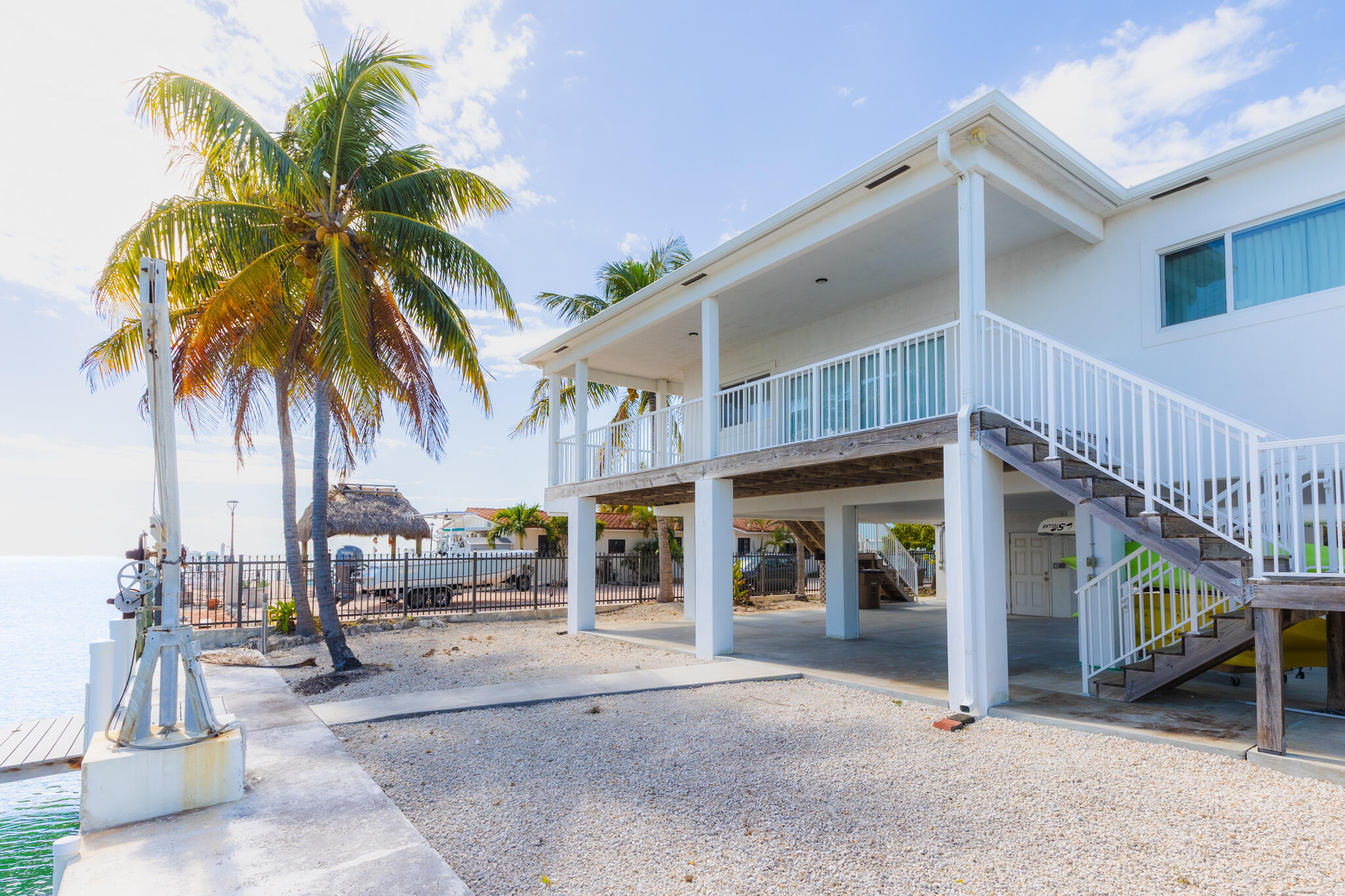 900 85th Street Marathon, FL 33050 - Photo 25 of 48 a view of a house with backyard and porch