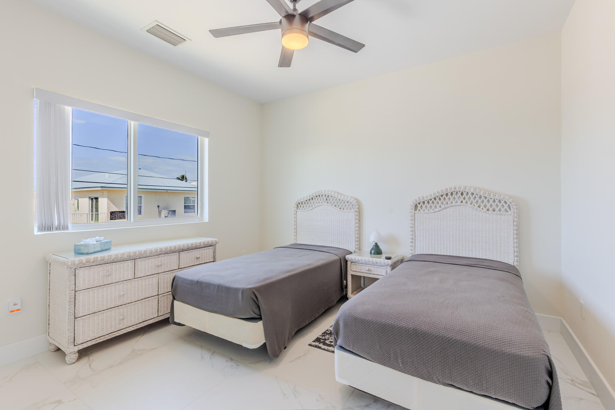 900 85th Street Marathon, FL 33050 - Photo 36 of 48 a bedroom with two beds and window