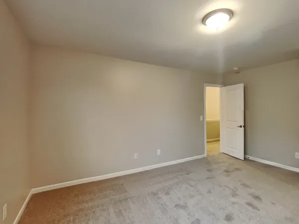 an empty room with an entryway
