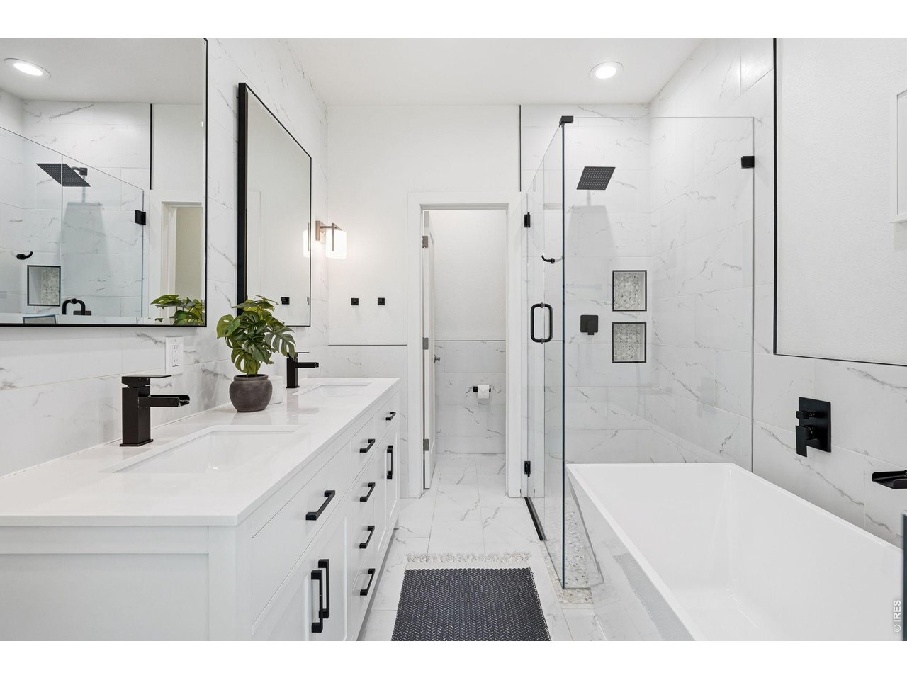 2900 Inca Street, Unit 23 Denver, CO 80202 - Photo 15 of 29 Updated primary bathroom