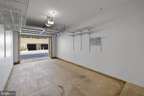 a backyard of a house with lots of green space and garden