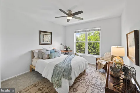 a kitchen with granite countertop a sink and cabinets