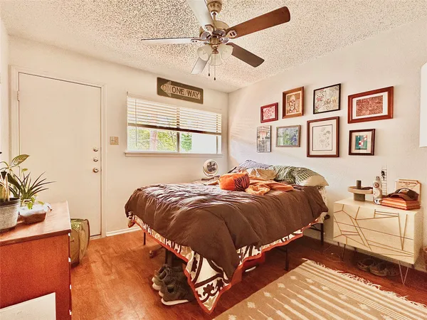 a bed room with a bed and a couch